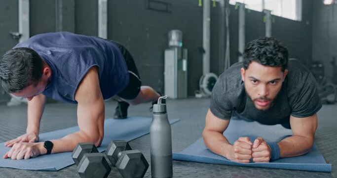 Fitness, plank pushup and friends exercise at gym for health, wellness and muscle power. Sports, teamwork and men training with push up, workout or exercising for core strength, energy and muscles