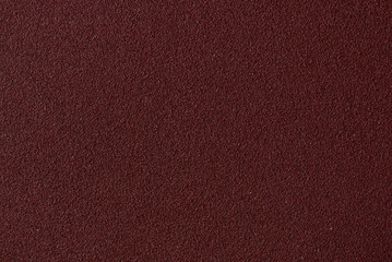 Texture of red sandpaper.Rough sandpaper background.