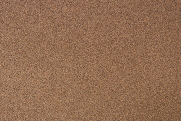 Fototapeta na wymiar Texture of brown sandpaper.Rough sandpaper background.