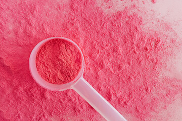 Close-up of pink powder, beetroot or berry sublimate, food supplement