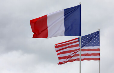 American and French flags flying together sign of international cooperation