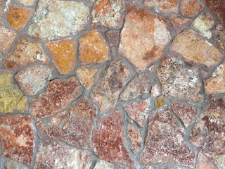 Stone background. Stone texture pattern. Pebble stones texture. Multi colored stones background