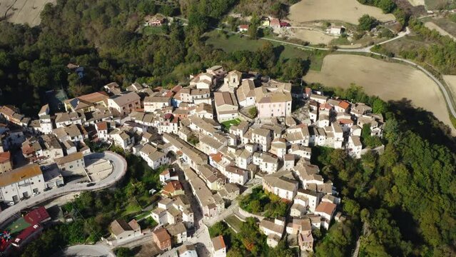 Aerial orbiting shot of hilltop town Fossalto in Molise region in Italy, 4K