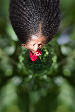 stressed african woman with braids