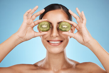 Beauty, skin care and woman with kiwi fruit face for dermatology, natural cosmetic and wellness....