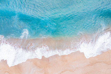 Fototapeta na wymiar A sea waves and beach aerial view, natural background.