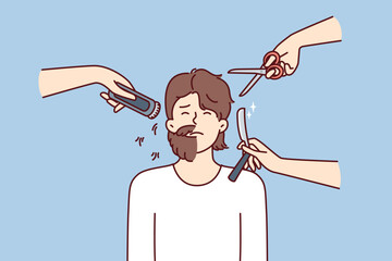 Hands with scissors and shaving devices around man with partially trimmed beard. Half-shaven guy is embarrassed about not wanting haircut or badly chosen barbershop