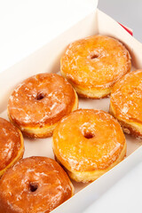 Glazed donuts in box unbranded packaging template mock up