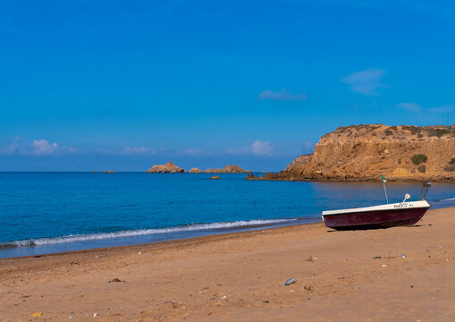 Boat on Madagh beach, North Africa, Oran, Algeria
