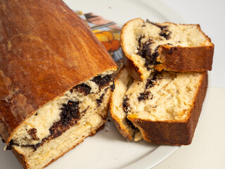 Freshly baked bread with poppy seeds.