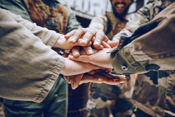 Soldier, team building or hands in a huddle for a mission, strategy or motivation on a paintball battlefield. Goals, collaboration or army people with support in a partnership or military group - obrazy, fototapety, plakaty