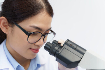 Fototapeta premium Research and development concept. Double exposure image of scientific and medical lab instrument, microscope, microbiology and chemistry