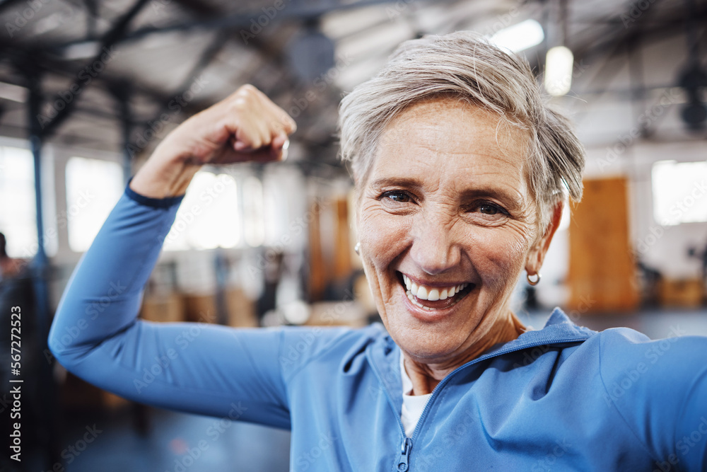 Canvas Prints Senior woman, flexing and smile for selfie or profile picture in exercise, workout or muscle training at the gym. Portrait of happy elderly female in fitness smiling for vlog, social media or post