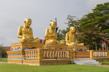 Phuket. Thailand. November 15 2022. Three traditional giant statues of old Buddhist monks in meditation postures