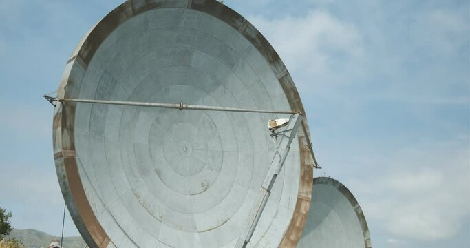 Large dishes. Parabolic antennas of an abandoned military base.Large dishes placed on a mountain, used in the past for radio transmissions. 
