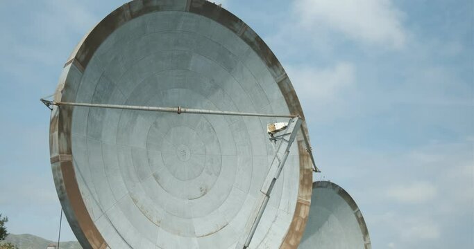 Parabolic antennas. Parabolic antennas of an abandoned military base.Large dishes placed on a mountain, used in the past for radio transmissions. 