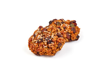 Homemade oat cookies with seeds, isolated on white background.