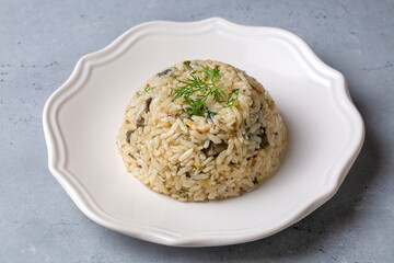 Traditional delicious Turkish food; rice pilaf with pine nuts and currants (Turkish name; ic pilav...