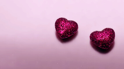 Obraz premium Two hearts purple glitter on a pink background. Flat lay, copy space, card, wallpaper, Valentine's Day message, wedding, love & romance concept 4K 