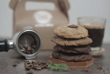 Stacking cookies with espresso coffee and garnish coffee beans