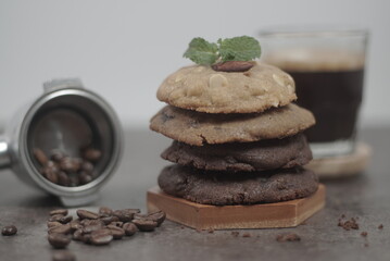 Stacking cookies with espresso coffee and garnish coffee beans