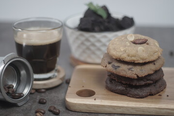 Stacking Cookies with black coffee and small brownies