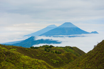Fototapeta premium Mount Sumbing and Mount Sindoro panorama viewed from the top of Mount Prau Central Java