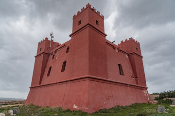 Red tower called It-Torri L-Ahmar in the North of Malta. 