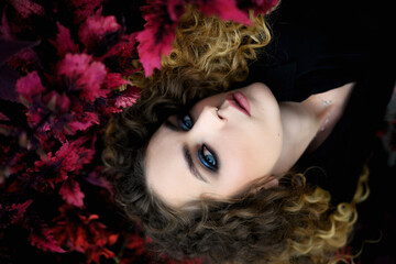 Naklejka premium Portrait of young beautiful woman. Natural light. Shallow depth of field.