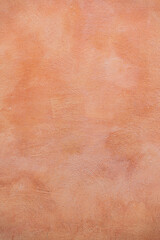 Terracotta orange texture of a wall in Italy