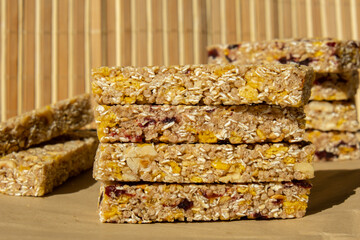 Homemade Granola energy bar. Variety of homemade protein granola breakfast bars, with nuts, raisins dried cherries and chocolate. Healthy nutrition eating Gluten free cereal dieting snack super food