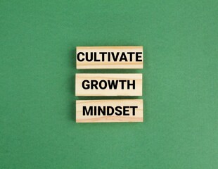 wooden board with the words Cultivate growth mindset. Personal development concept.