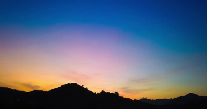 Sunrise dawn morning mountain timelapse with rising sun, sunset sky 4k clip