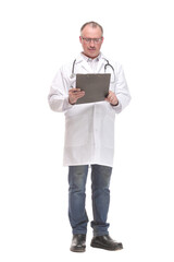 Front view of mature thoughtful doctor writing on clipboard