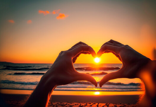 Manos de mujer formando un corazón con fondo de atardecer en el horizonte en la playa, generative ai.