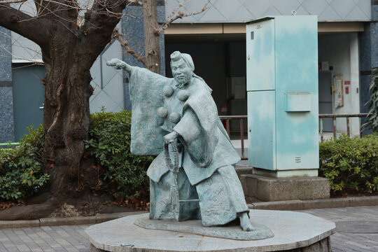TOKYO, JAPAN - January 29, 2023: Kanjincho no Benkei statue in Hamamachi Ryodo Park in Tokyo's Ningyocho. The statue is connected to kabuki theater.