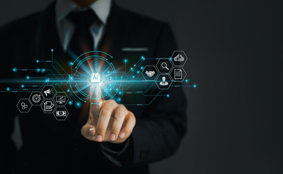 Technology Concept. Artificial Intelligence (AI), machine learning and data mining technology icons on a virtual interface with businessman touching blue button with electronic circuit