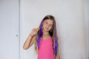 girl in a pink dress expresses different emotions