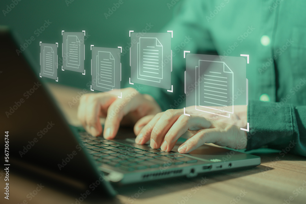 Aufkleber Document Management System (DMS), online documentation database and process automation to efficiently manage files. Corporate business technology. Employee man using a computer laptop in office.