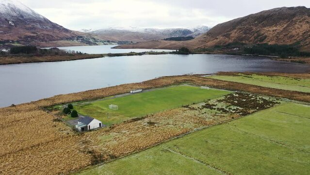 The GAA pitch close to Mount Errigal, the highest mountain in Donegal - Ireland.