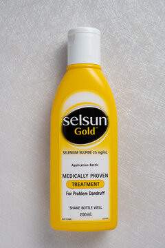 ZhongShan China-January 11,2023:bottle of Selsun Gold medically proven treatment for problem dandruff shampoo on white background.