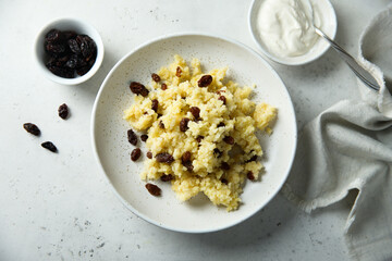 Homemade millet porridge with raisins