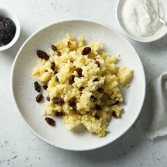 Homemade millet porridge with raisins