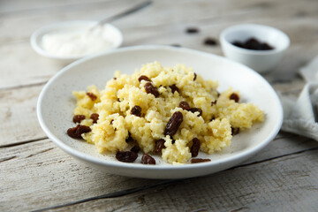Homemade millet porridge with raisins