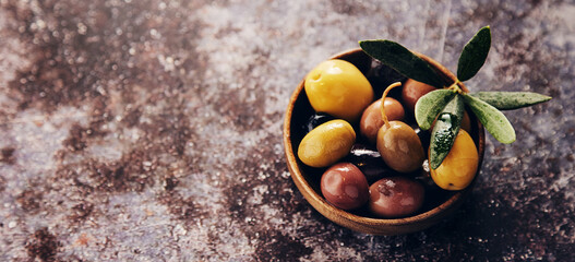 Fototapeta na wymiar Pickled tasty olives on table