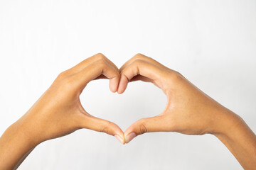 The gesture of two hands forming a heart
