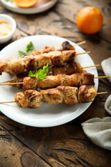 Homemade chicken skewers with orange