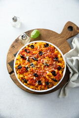 Homemade pasta bake with olives and tomato