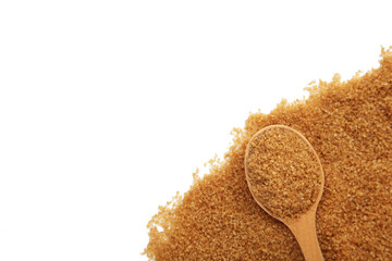 Brown sugar with wooden spoon isolated on white background.