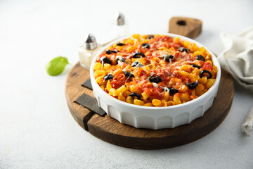Homemade pasta bake with olives and tomato